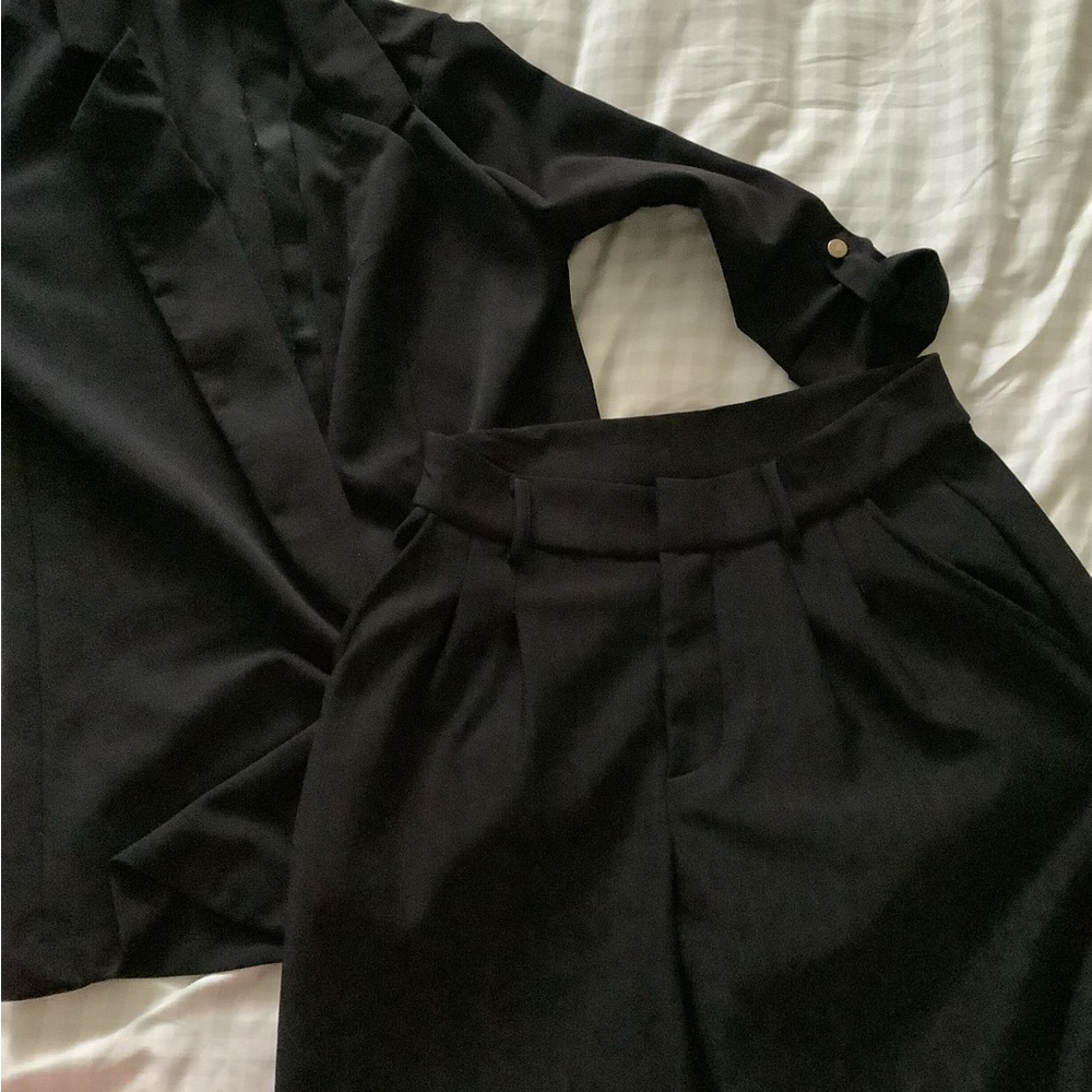 Black blazer and black plaid pants